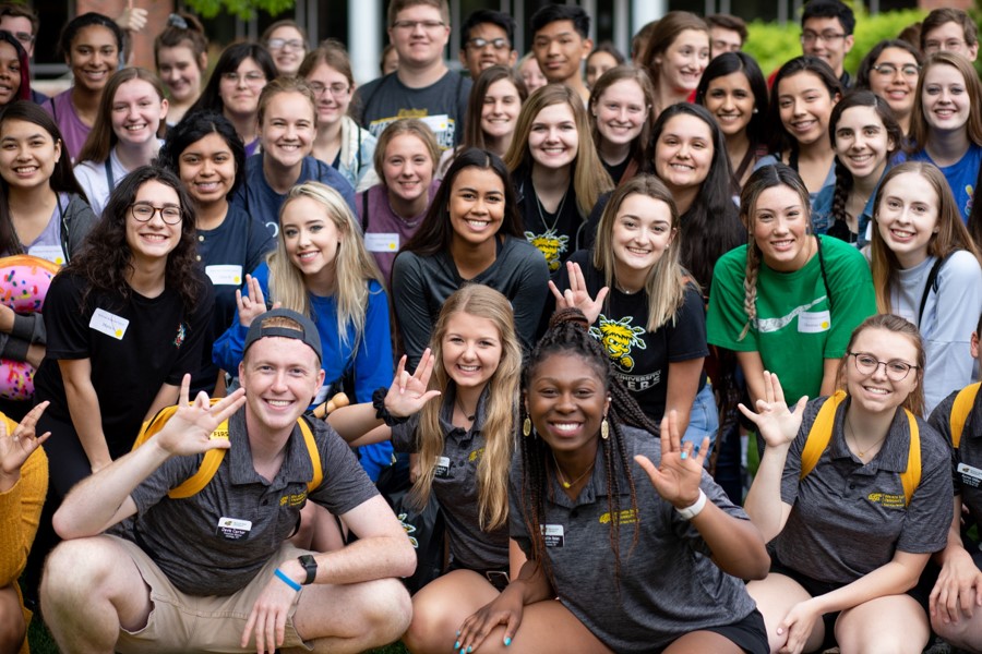 Group of smiling students at Orientation event